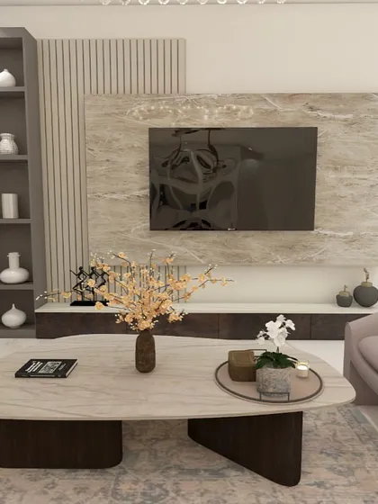 The living room design for ATS Pristine, featuring a marble-clad TV unit, a sleek display shelf, and a mix of modern and classic furniture for a timeless look.