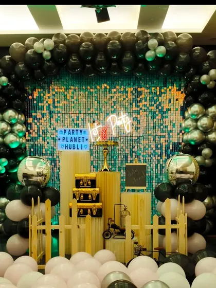 This setup shows a custom lightbox with my "Party Planet Hubli" branding. The black and silver balloon theme is versatile and works well for birthdays, anniversaries, or corporate events.
