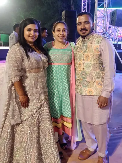 I love my job! Posing with the happy couple after their fantastic performance.