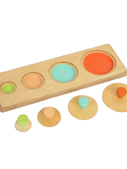 A wooden puzzle with the pieces removed and placed next to their slots, demonstrating how it works.