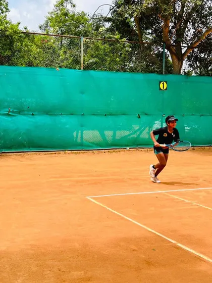 A shot of our player Eshita in action on the clay court during the NS U-12 AITA tournament in Hyderabad, where she reached the semi finals.
