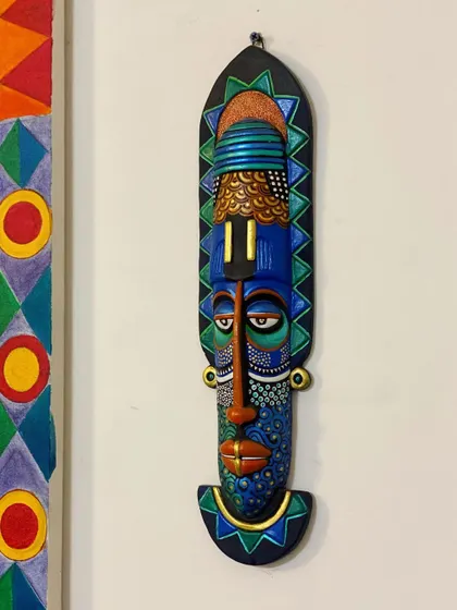 A duplicate image of the mask, a personal piece that reflects my love for color and transformation.