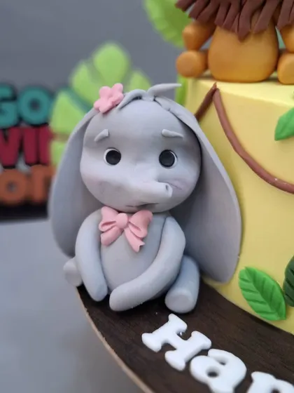 A close-up of the big-eared elephant figurine.