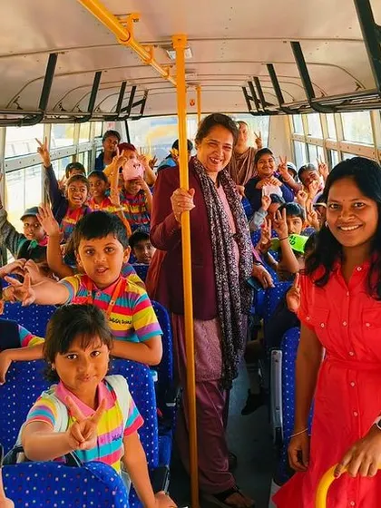 All smiles on the bus! Our students and teachers are excited for their day of adventure at Jain Farm.