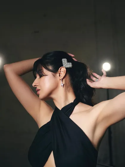 A detail shot from the 'Yaariyan 2' promotional styling, focusing on the hair accessories and jewelry. Every element is chosen to complement the overall edgy aesthetic of the outfit.