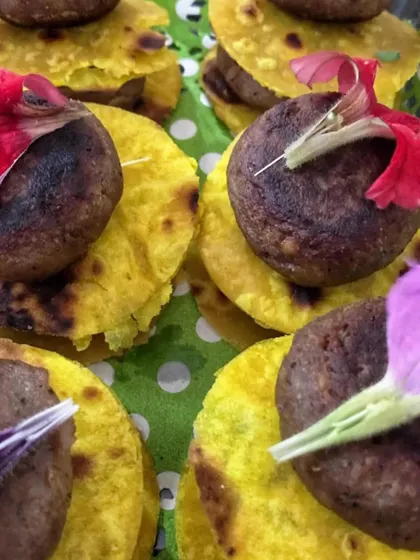 A close-up of my Galouti Kebab served on mini saffron-infused parathas. These melt-in-your-mouth kebabs are a highlight of my Awadhi cuisine offerings and are perfect as an appetizer for any party.