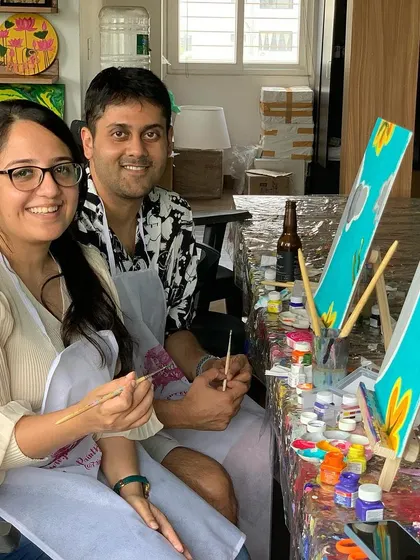 A couple enjoying a sip and paint workshop in our Bangalore studio. It's a great way to spend a relaxing evening and socialize with fellow art enthusiasts.