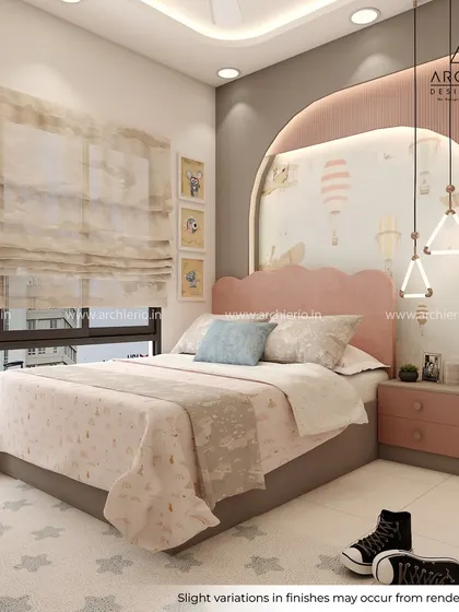 A cozy and cute kids' room with a pink scalloped headboard and hot air balloon wallpaper. The design is soft, dreamy, and perfect for a little one's sanctuary.