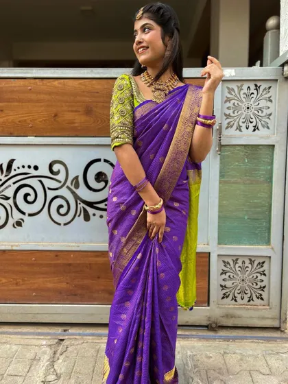 The bright colors of this saree are sure to make you stand out in any crowd.