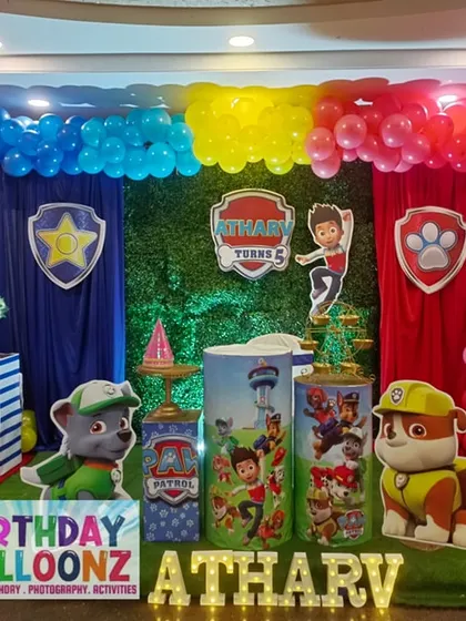 For this 5th birthday, I brought the world of Paw Patrol to life. The setup includes custom backdrops for each character like Chase and Marshall, vibrant balloon columns in the show's signature colors, and themed props to make the birthday boy feel like part of the rescue team.