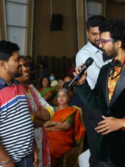 A close-up interaction with a parent during a fun activity.