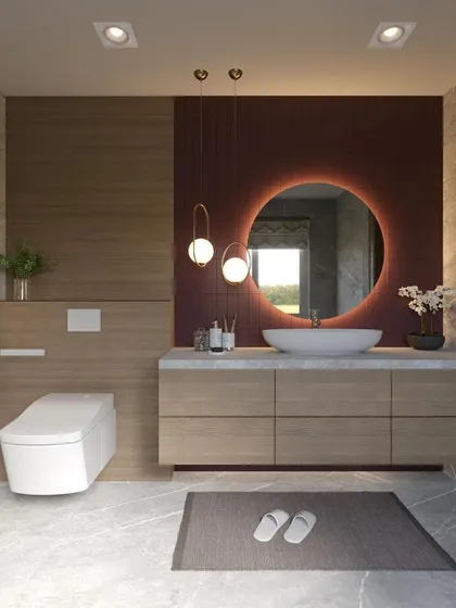 I transform bathrooms into personal spas. This design uses a mix of wood-look and marble-textured tiles, a floating vanity to create a sense of space, and a backlit circular mirror that provides a soft, flattering glow.