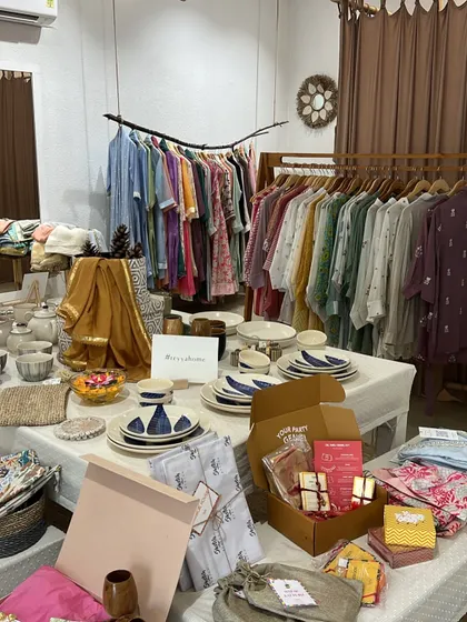 A beautiful display of kurtas and ceramic tableware in a Jaipur concept store. Shopping here is an experience that combines fashion with lifestyle and home decor.
