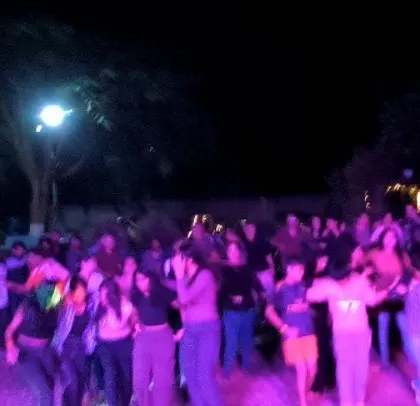 Another shot of the outdoor party after the sports tournament.