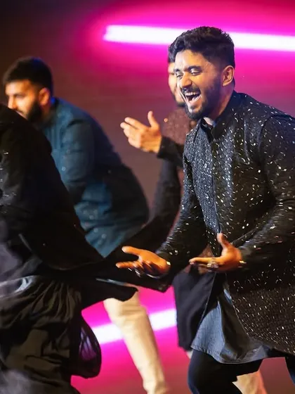 Pure energy and expression from the groom and his friends during their power-packed performance.