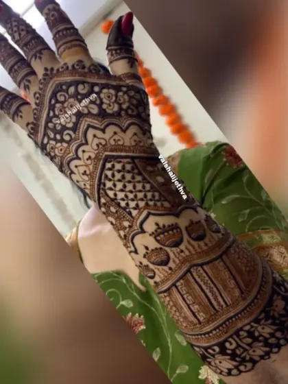 A side view of a heavy back-hand design. This angle shows the beautiful cuff and the intricate patterns that extend along the side of the hand.