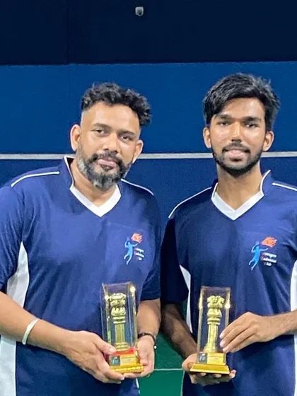 Posing proudly with the rewards of hard work and great teamwork.