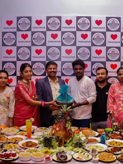 We love being part of your celebrations. Here, guests are seen enjoying the festive atmosphere created by our impressive buffet spread, a testament to the joy our food brings to any occasion.
