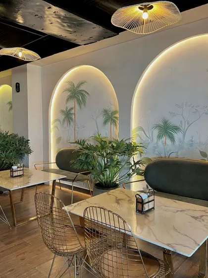 The completed dining area with the beautiful murals as a backdrop.