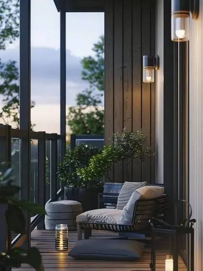 This balcony is designed for evening ambiance, with modern wall sconces and candle-lit lanterns. The simple, comfortable seating makes it a perfect place to unwind after a long day.