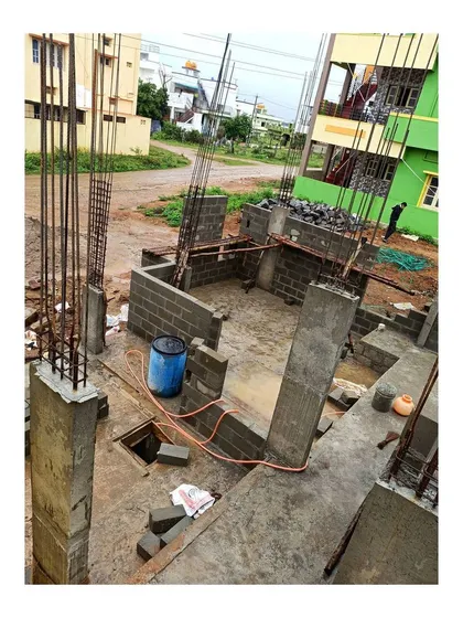 Here you can see our on-site construction work in progress for a residential project in Mysore. This image demonstrates our hands-on approach to project management, ensuring that the architectural vision is executed with precision, from the foundation and structural framework to the final finishes.