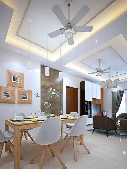 This design showcases a bright and airy open-plan living and dining area with a Scandinavian-modern feel. I used light wood tones, simple pendant lighting, and clean lines to create a space that is both functional and calming. The dual false ceilings with cove lighting help define the two zones.
