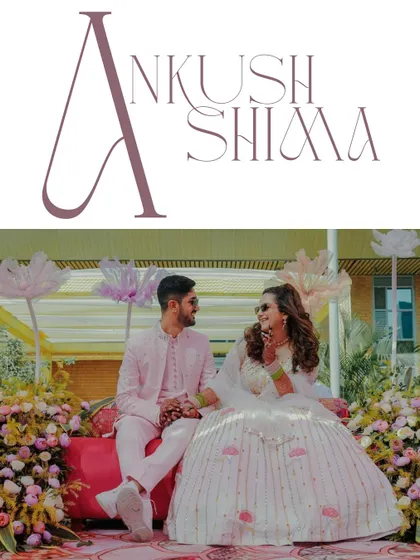 A beautiful shot of the couple seated amidst stunning floral decor during their Mehendi. Their coordinated pastel outfits and happy smiles make for a picture-perfect moment.