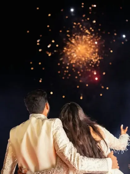 The couple watching the fireworks we arranged for their Sangeet, a spectacular end to the evening.