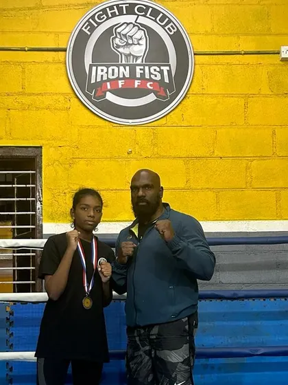 Our silver medalist, Angel, standing with me after her win at the Karnataka State Boxing Championship. We are incredibly proud of our young fighters' achievements.