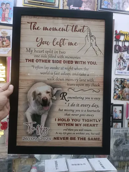 A heartfelt and unique way to remember a beloved pet. This memorial frame features a photo of the dog, its name, and a touching poem.