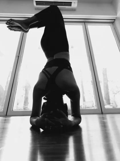 A powerful silhouette of a headstand, a preview for my Core & Inversions workshop. Turning upside down builds confidence and strength.