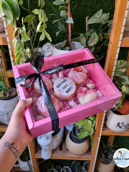 A mini treats box I created for a birthday countdown and a proposal. The secret message was hidden inside the smashable piñata hearts, which is such a cute idea.