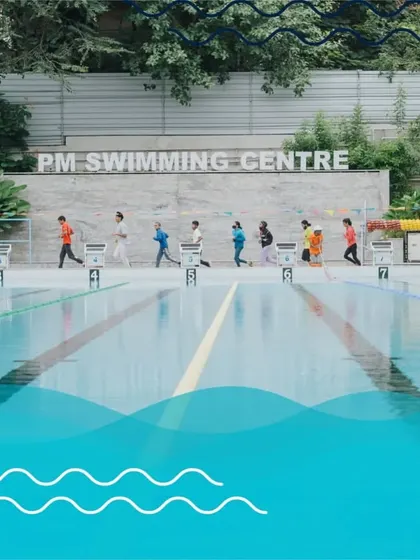 Our poolside area is spacious, allowing for pre-swim warm-ups and drills, as seen with this group of students.