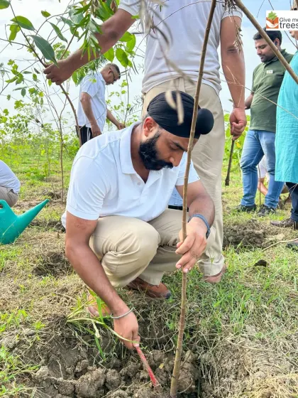 Members of Rotaract and ITBP working side-by-side. These images capture the spirit of community service, where diverse groups unite for a single, positive goal: a greener environment.