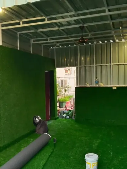 This is a full room makeover where I covered both the walls and the floor with artificial grass. It creates a very unique, immersive green space.