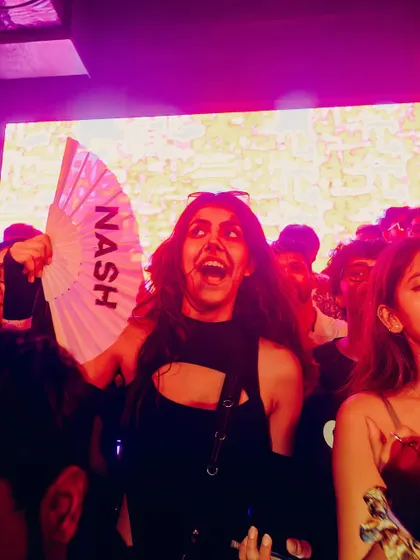 A fan showing love with a custom "NASH" fan. Seeing this kind of support from the crowd is the best feeling.