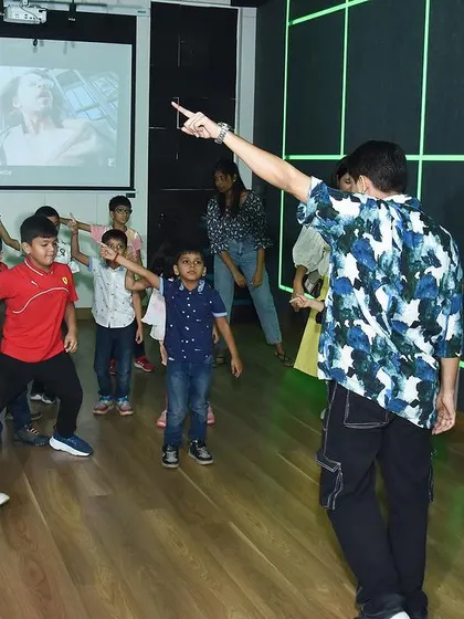 Moments from a high-energy dance party and workshop for kids. These events are full of fun, learning basic choreography, and enjoying dance in a group.