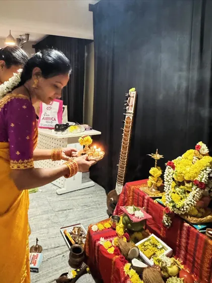 A student offers prayers during the Saraswati Pooja. We instill a deep respect for the spiritual side of music in all our students.