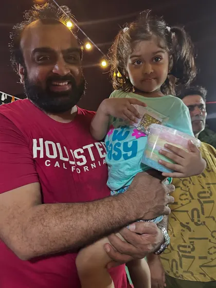 Capturing a sweet moment between a father and his daughter. They were so happy to take home their custom gifts from my stall.