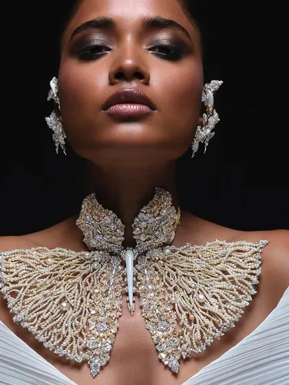 Photographing this exquisite butterfly necklace for Bina Goenka was about capturing artistry with artistry. The goal was to let the intricate details of the diamonds and pearls shine, using focused light to create a powerful, minimalist beauty portrait.
