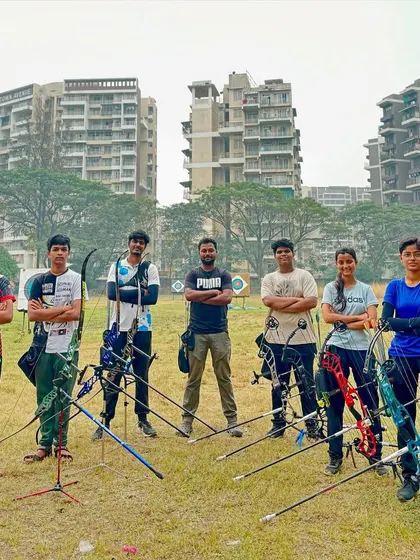 You'll be joining a community of passionate archers. This is part of our Drona Archery team, a group of dedicated students who train together, support each other, and share a love for the sport.