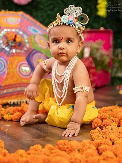 A more contemplative little Krishna. I love capturing the different moods and expressions of the babies during these sessions.