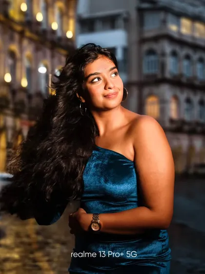 This portrait was shot at night in Mumbai, using the blurred lights of the city to create a dreamy backdrop. The goal was to capture a portrait that shines, even in low light conditions.
