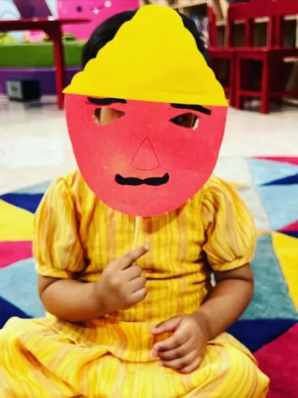A close-up of one of our little artists with their Ravan mask. These simple crafts are a great way to talk about complex stories like the Ramayana.