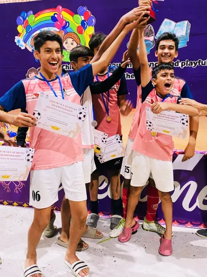 The sheer excitement of a win. Our players can't contain their happiness after being crowned champions in their age group.