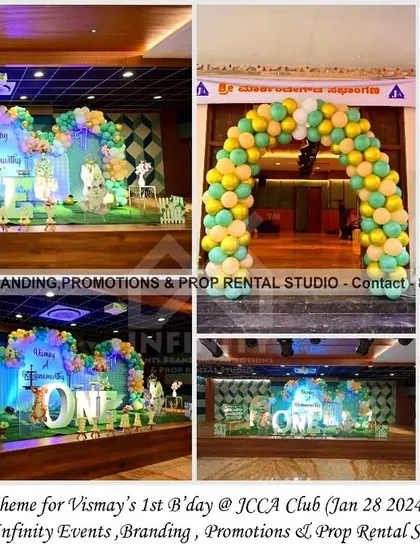 Some bunny is turning one! This adorable bunny theme for a first birthday at JCCA Club features a large backdrop with a balloon garland, a "ONE" table, and cute bunny cutouts, all set against a lush green artificial grass floor.
