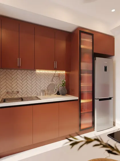 This view shows the utility side of the rust-toned kitchen, with additional storage and a secondary sink, all designed with the same cohesive aesthetic.