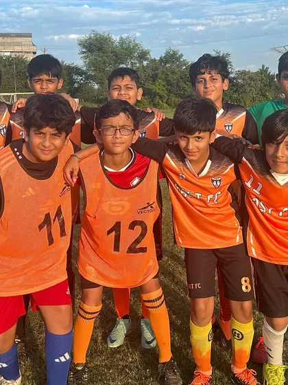 Our U11 team, all smiles after a friendly match against Global Sports. Continuous exposure to matches is key to their development.