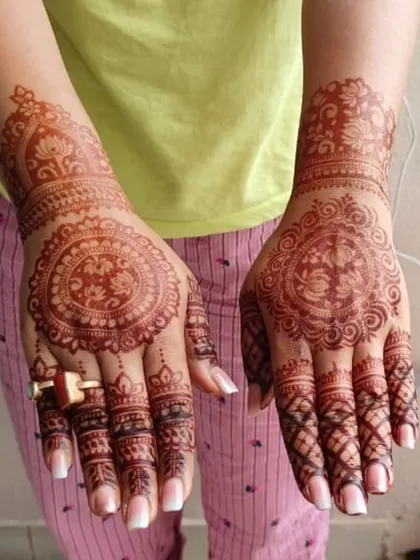 A beautiful mandala design for Diwali, showing the rich stain and intricate patterns.