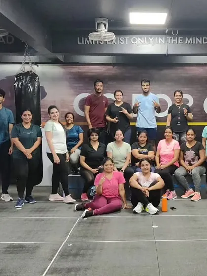 The heart and soul of my classes. Each photo captures a unique moment with my incredible community after a sweaty, joyful session. This is our shared victory lap.